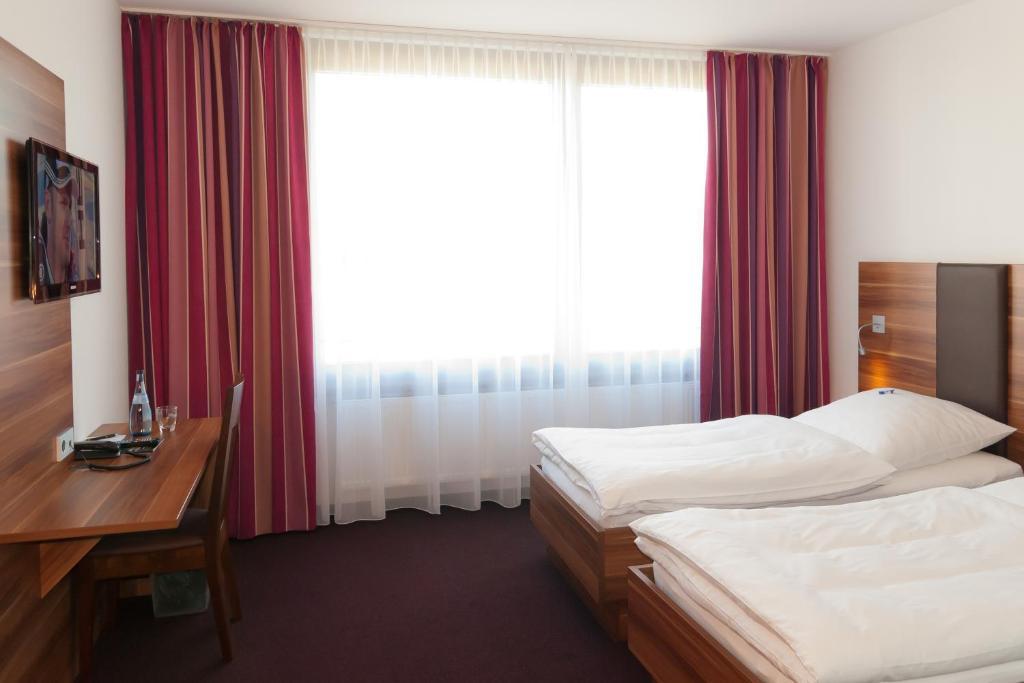 Hotel Sentio Vöhringen Oda fotoğraf